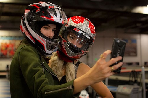 pictures of two girls taking a selfie at k1 speed