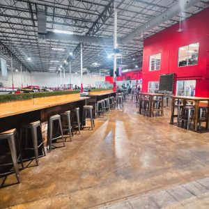 seating surrounds the kart track at k1 speed tampa bay