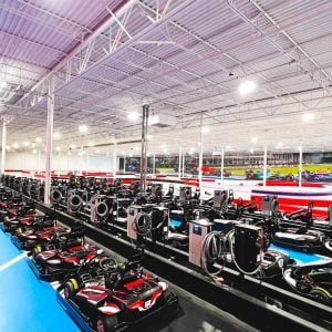 rows of go karts line up in the pits at k1 speed rogers