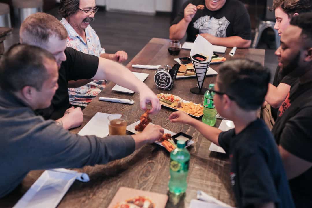 everyone grabbing food at K1 Speed's Paddock Lounge in Dublin