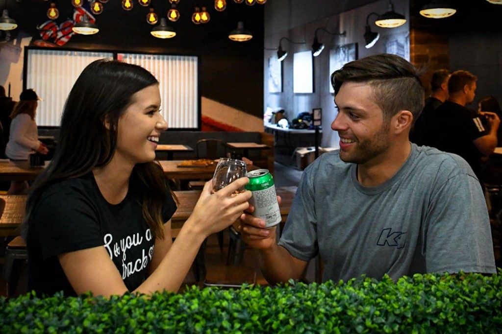 k1 speed couple toasting