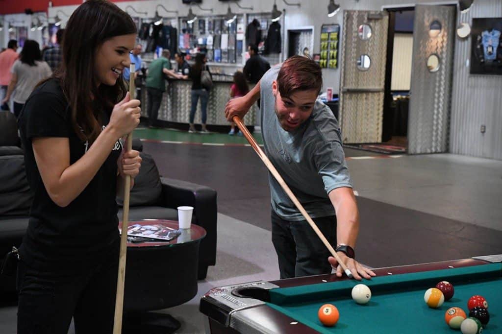 k1 speed couple playing pool