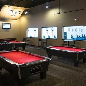 the montreal lounge at k1 speed addison with pool tables, foosball and shuffleboard