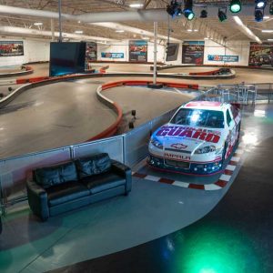 a nascar vehicle sits on display at k1 speed arlington