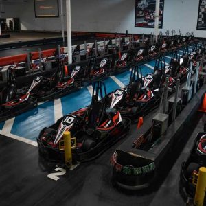 the pits with rows of electric indoor go karts at k1 speed dallas