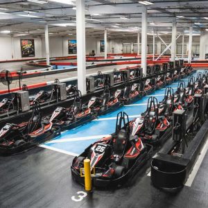the pits with rows of electric go karts at K1 speed san diego