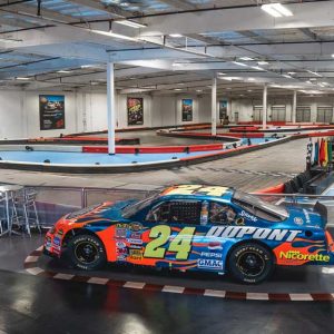 a jeff gordon nascar car sits on display at k1 speed san diego