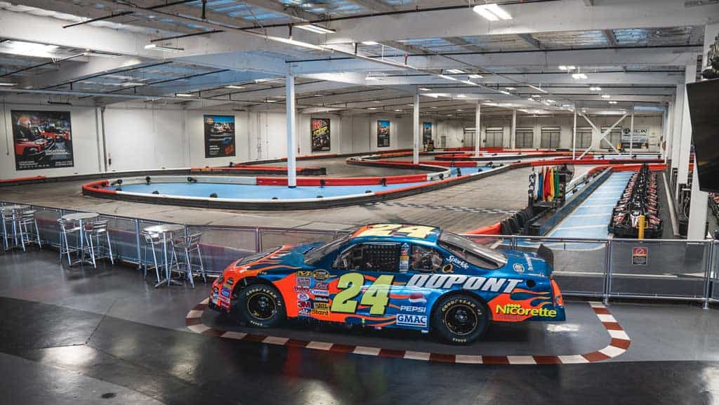 a jeff gordon nascar car sits on display at k1 speed san diego