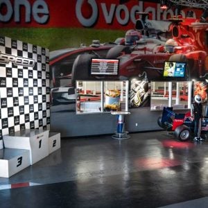 The podium and Red Bull F1 car on display in K1 Speed San Francisco