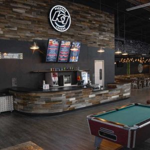 The main counter of K1 Speed's Paddock Lounge in Torrance