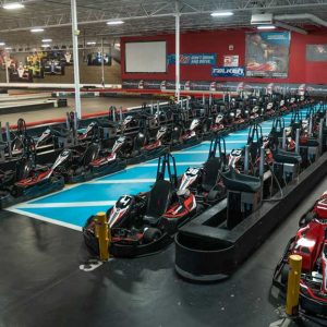 electric go karts line up in the pits at k1 speed houston