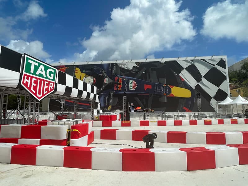 a shot of the outdoor kart track during the miami f1 weekend, with tag heuer and red bull racing sponsorship