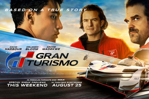 Promotional image for Gran Turismo the movie featuring race cars and actors