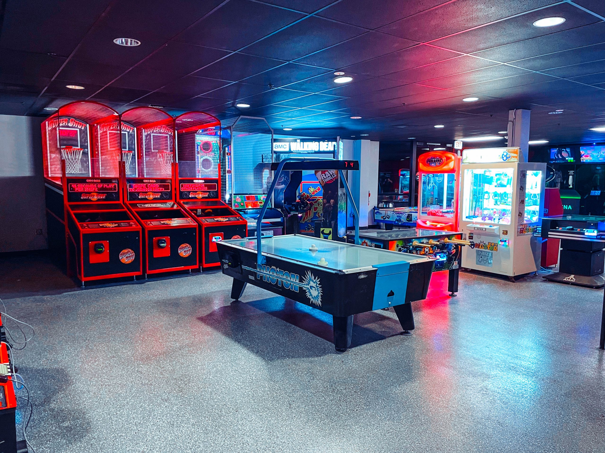 Some of the arcade games and air hockey available at K1 Speed in Vegas.