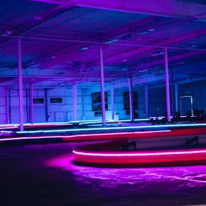 the indoor track at new orleans illuminated by the led lights on the barriers