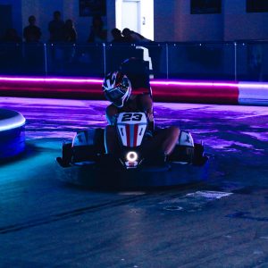 a go kart races at k1 speed new orleans with led illuminated barriers