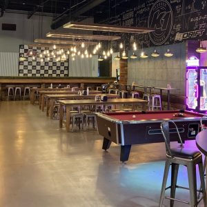 pool tables sit near the paddock lounge at k1 speed boston