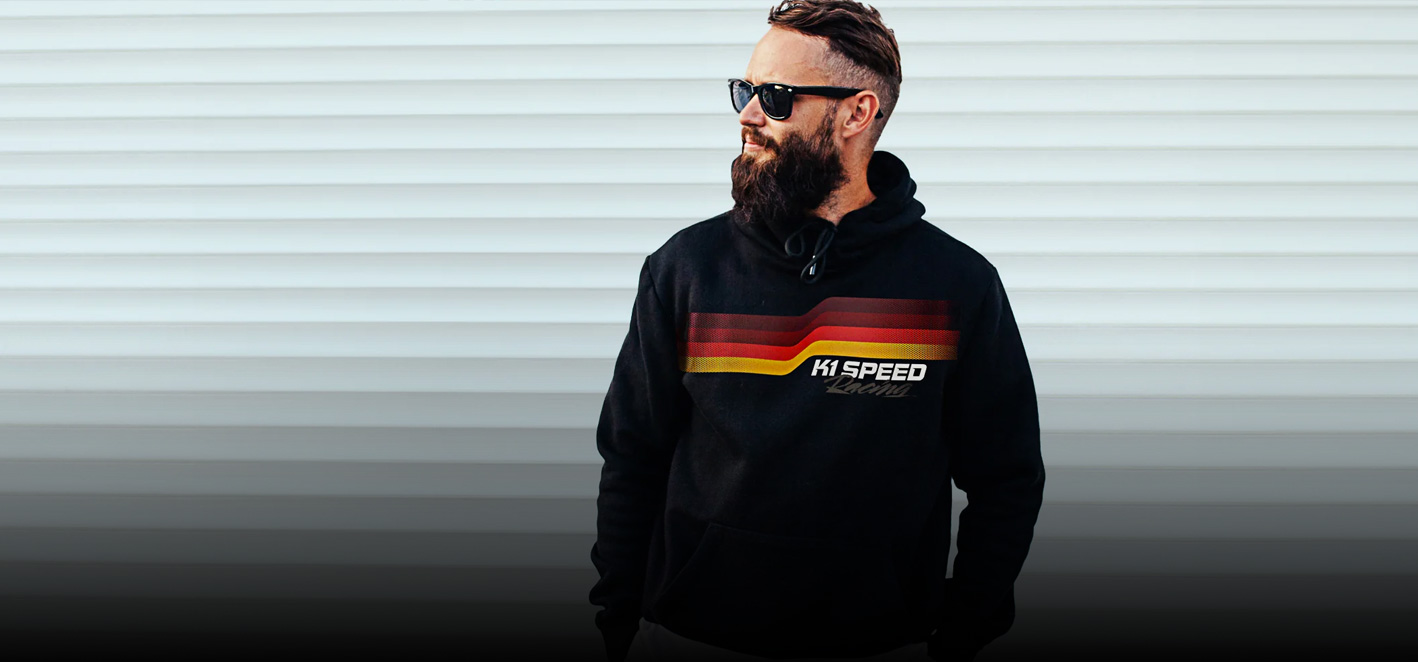 bearded guy in a k1speed hoodie