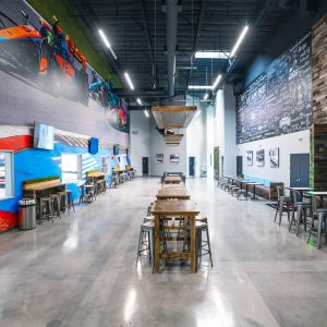 the lobby at k1 speed chula vista with windows looking out to the track