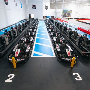 all-electric go karts line up in the pits at k1 speed chula vista
