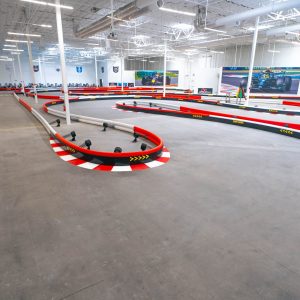 a section of indoor track at k1 speed chula vista featuring a 180-degree hairpin