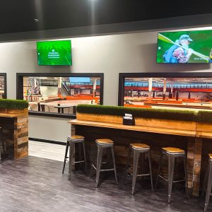 windows look out to the track inside k1 speed daytona beach's new paddock lounge