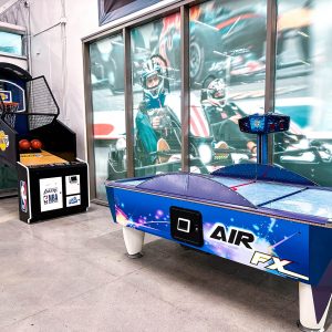 an air hockey tablet and hoops inside the chula vista arcade