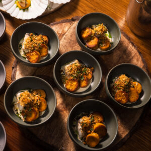gourmet dishes served in bowls sit on display at k1 speed canary wharf during an event