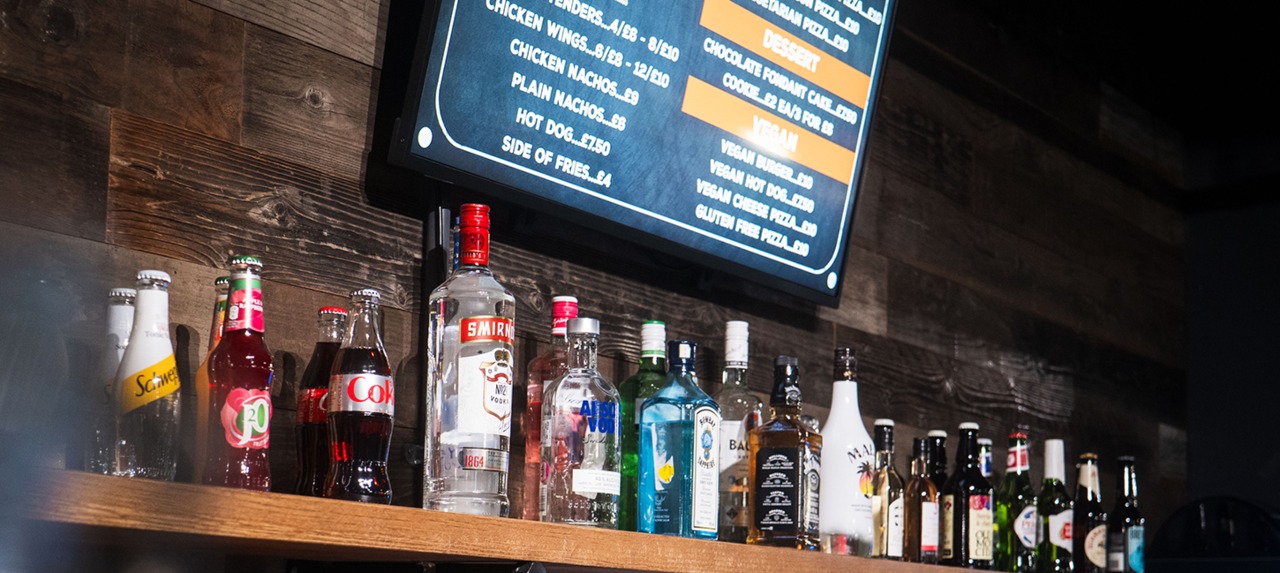 a shot of the bar inside k1 speed canary wharf in london