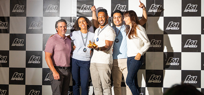 Adult party podium celebration at K1 Speed