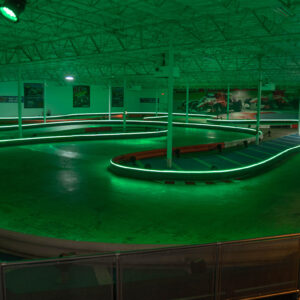 the indoor track at k1 speed san antonio lit by led lights