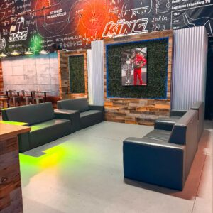 Seating and the wall design at K1 Speed Indianapolis.