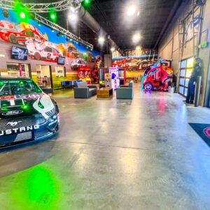 The K1 Speed Rogers' lobby featuring a NASCAR vehicle on display