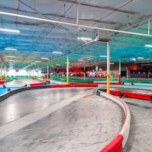 A view of the track at K1 Speed Sandy with the Paddock Lounge and lobby in the background.