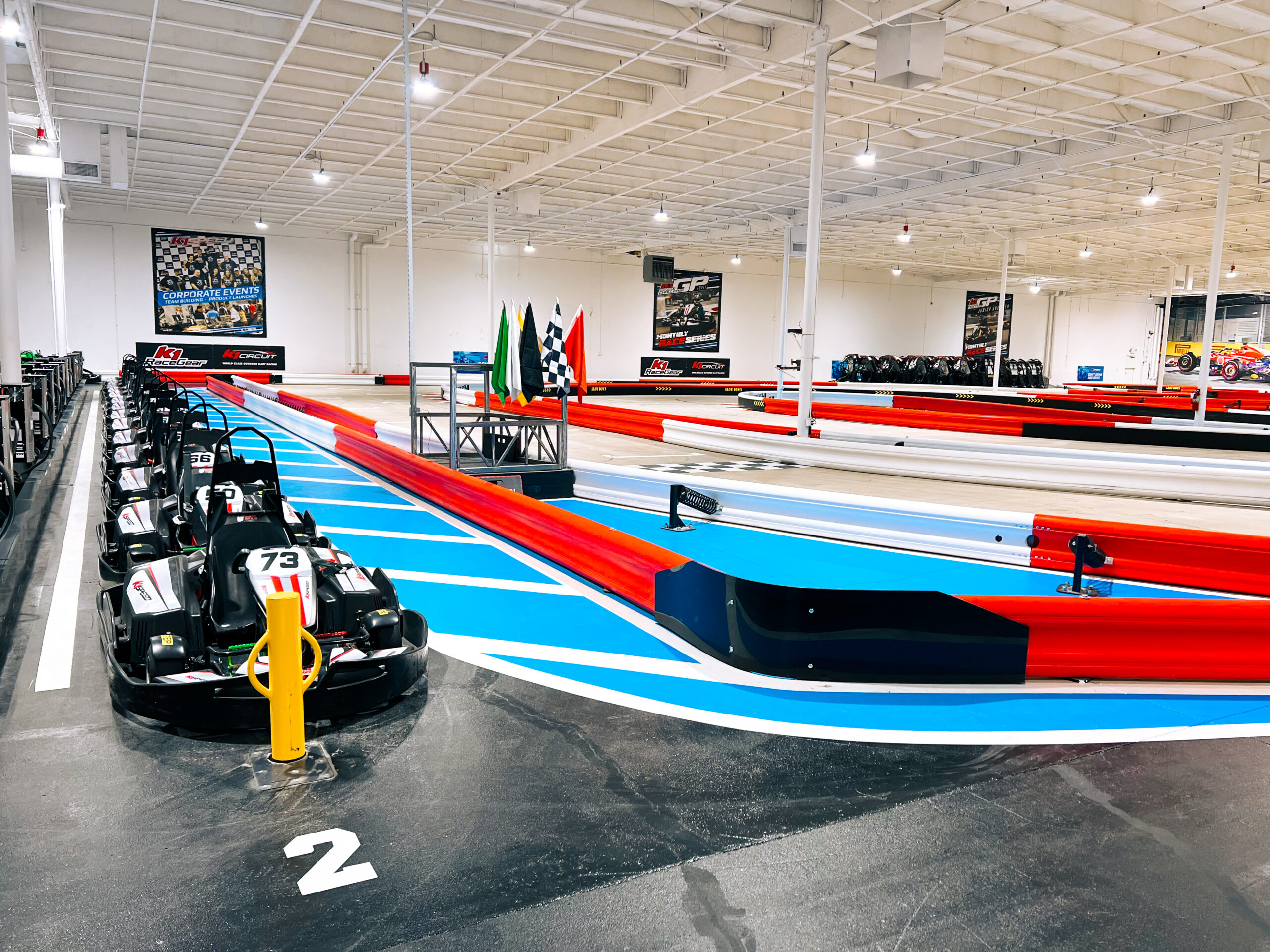 A row of go-karts in pitlane.