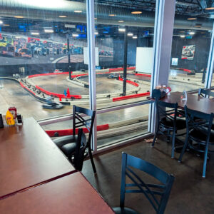 The view of the indoor track from the Paddock Lounge at K1 Speed Mokena.