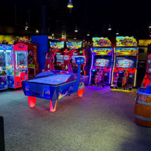 The arcade at K1 Speed Addison, including prize games and air hockey.