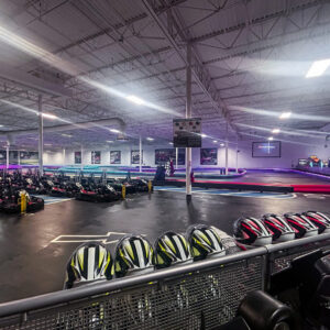 The indoor go-karting track at K1 Speed Atlanta, with led lights for Glo Karting nights.