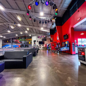 The trackside seating and some of the arcade games at K1 Speed Bend.