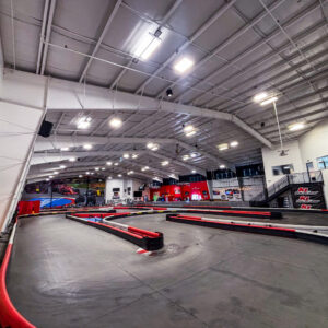A view of a hairpin turn on the indoor go-karting track at K1 Speed Bend.