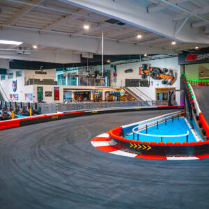 A wide shot of the multi-level indoor track at K1 Speed Culver City