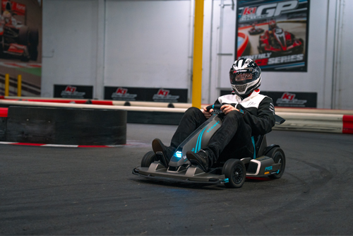 A Segway Go kart Pro Two racing on the indoor track at K1 Speed