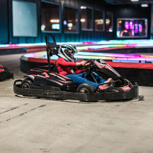 a kid races a go-kart at K1 Speed in Oxford, Michigan