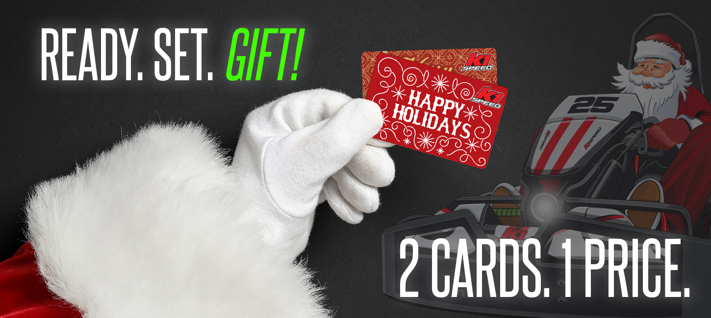 santa's gloved hand holding two gift cards with text reading "ready. set. gift" "2 cards. 1 price."