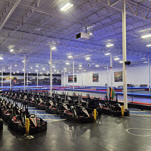 Three rows of go-karts in the pit lane at K1 Speed Denver.