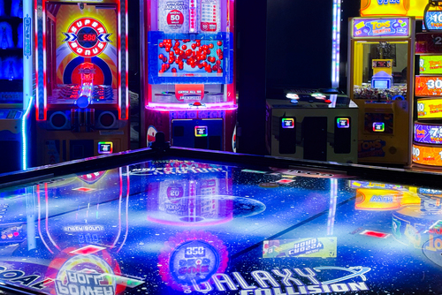 A four-person air hockey game at K1 Speed Jessup.