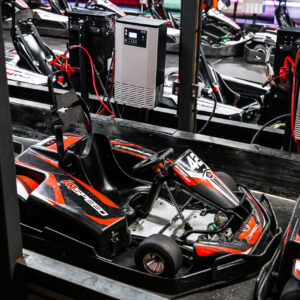 An OTL electric go-kart in the pits at K1 Speed Oxford