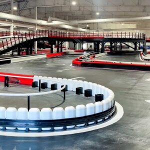 A turn at K1 Speed Totowa, with red and white track bumpers.