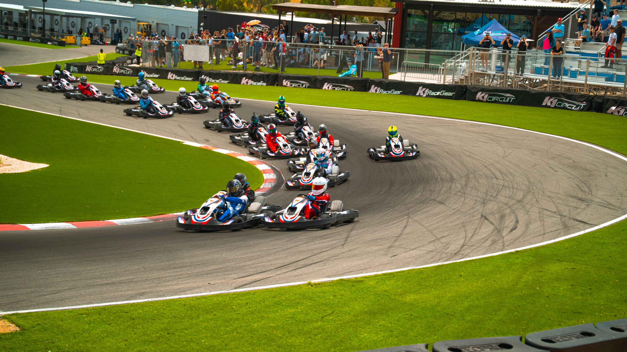 Lots of go-karts racing at K1 Circuit during the K1 Speed E-Karting Championships in 2026