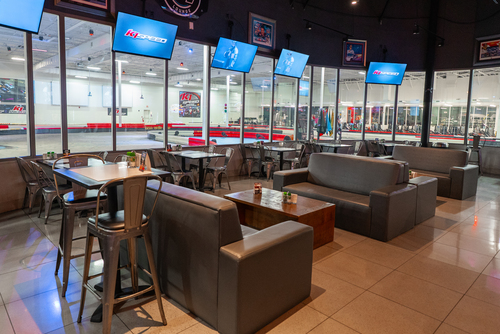 The family dining area at K1 Speed Orlando's Paddock Lounge.